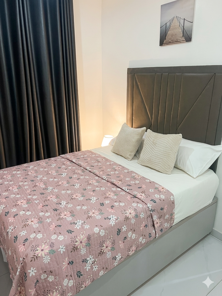 Ground floor bedroom with upholstered headboard and en-suite