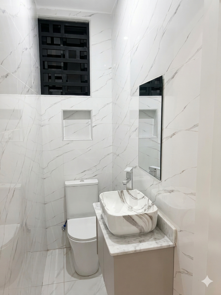Guest WC with marble vessel sink and decorative screen window